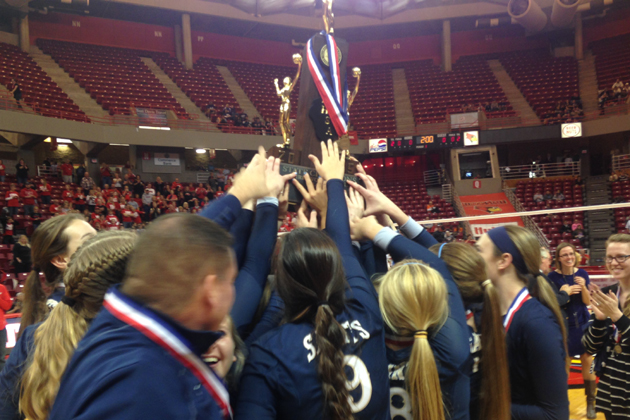 Central Catholic celebrates with the state title trophy after defeating Orion in the Class 2A state final game. (Joe Ragusa/WJBC)